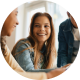 Smiling student talking with friends